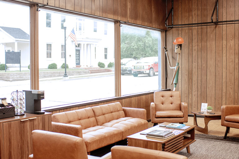 Comfortable customer waiting area inside Newnum & Sons Garage